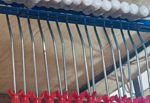 Mini Paint Roller Handles on Retail Hardware Display Rack 库存照片