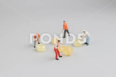 Mini of painters of workers with candy Stock Photos