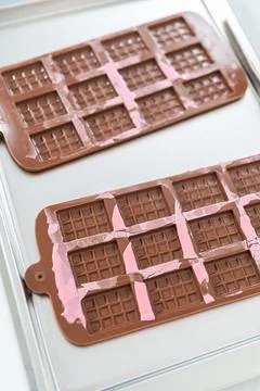 Mini pink chocolates Stock Photos
