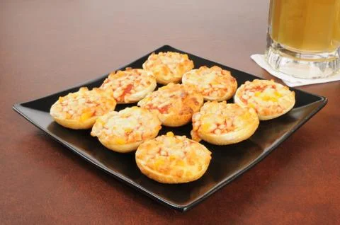 Mini pizza bagels Stock Photos