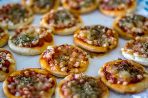 Mini pizzas. Selective focus Stock Photos