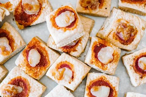 Mini pizzas on a white background, top view Stock Photos