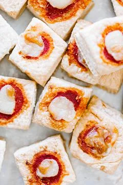 Mini pizzas on a white background, top view Stock Photos