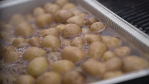 Mini potatoes in a boiling water Video stock 218612667