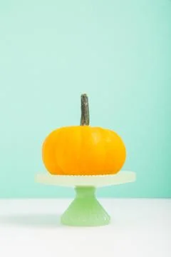 Mini pumpkin on green Stock Photos