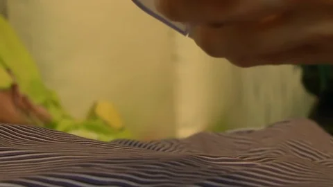 Mini razor for cleaning textiles. Stock Footage 79166043