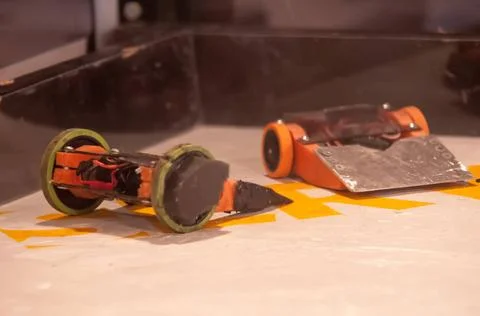 Mini robot wars mini robot wars indoors by a human controllers Copyright: ... Stock Photos