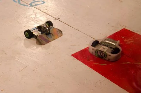 Mini robot wars mini robot wars indoors by a human controllers Copyright: ... Stock Photos