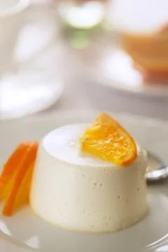Mini round orange cheesecake 스톡 사진