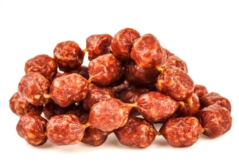 Mini sausages on white background Stock Photos