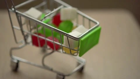 Mini shopping basket with sweets Stock Footage 153130890