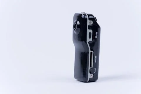Mini spy hidden camera over white background Stock Photos