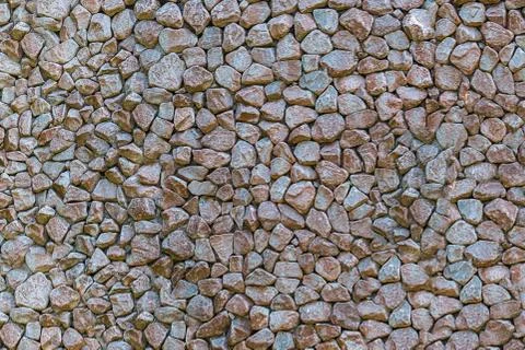 Mini stones gray light pattern hard base wall panel uneven base set of cobble Foto stock