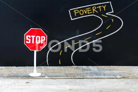 Mini STOP sign on the road to POVERTY Stock Photos