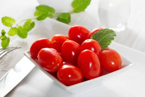 Mini tomatoes on a platter Stock Photos