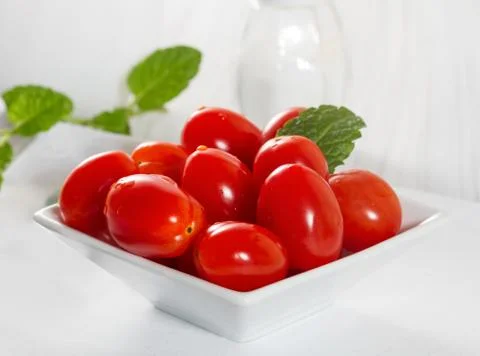 Mini tomatoes on a platter Stock Photos