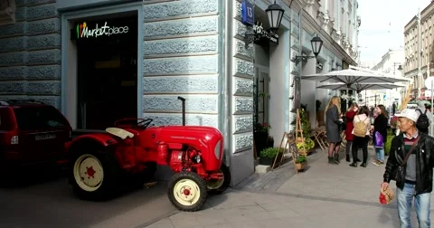Mini tractor at the cafe wall Stock Footage 68053936