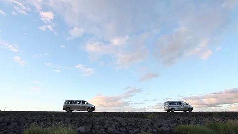 Mini Van car goes at sunset in Iceland Video stock 70692630