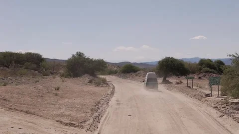 Mini van driving along the mystical Ruta 40 in northeastern Argentina, on Stock Footage 279493718