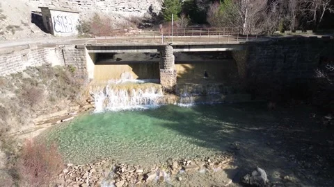 Mini waterfall in the middle of the mountain Stockbeeldmateriaal 234129146