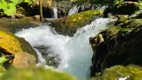 Mini waterfalls in slow motion Stock Footage