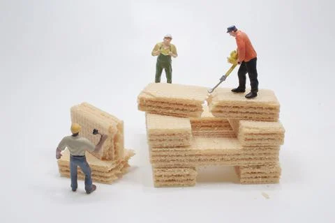 A mini of the worker work on the waffle Stock Photos