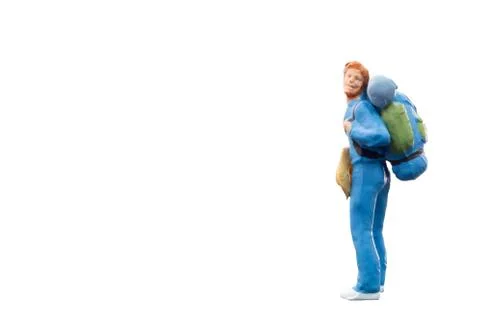 Miniature Backpacker  isolated on white background Stock Photos