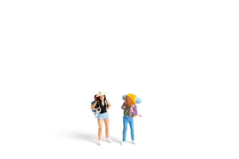 Miniature Backpacker  isolated on white background Stock Photos