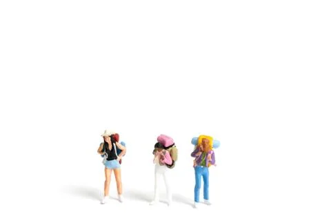 Miniature Backpacker  isolated on white background Stock Photos