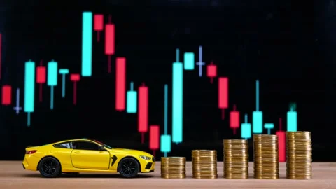 Miniature car and stack of golden money coin on wooden desk Stock Footage 281140426
