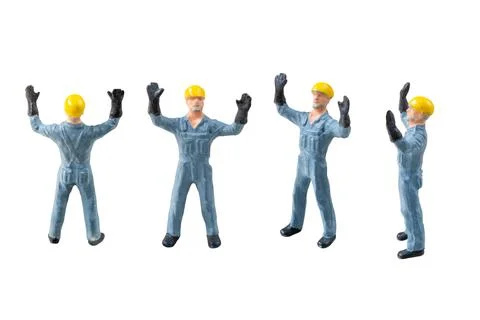 Miniature construction worker  isolate on white background with clipping path Stock Photos