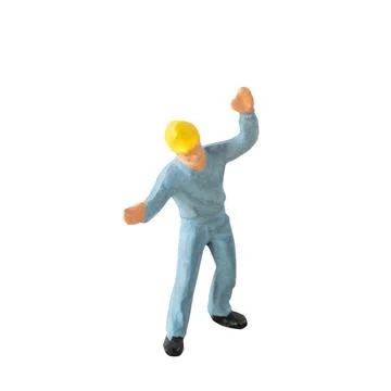 Miniature construction worker  isolate on white background with clipping path Stock-Fotos