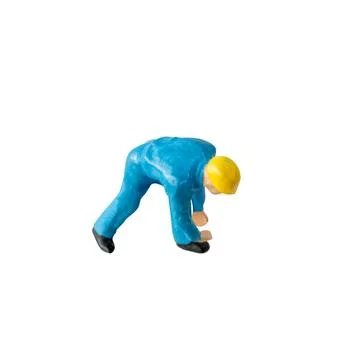 Miniature construction worker  isolate on white background with clipping path Stock Photos