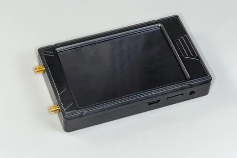 Miniature electronic unit with screen and high-frequency coaxial connectors Stock Photos