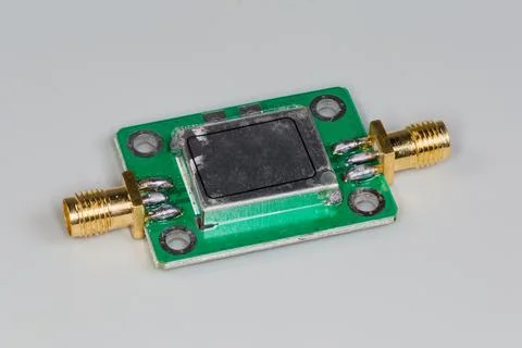 Miniature electronic unit with two high-frequency coaxial connectors Stock Photos