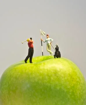 Miniature golf on apple Stock-Illustration