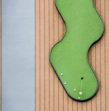 Miniature Golf as a concept image of focus and concentration Stock Photos