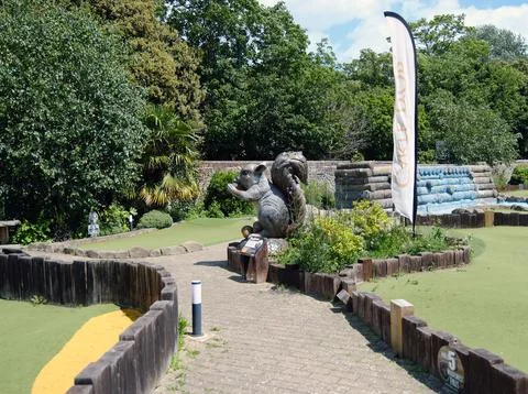 Miniature Golf Course Squirrel Statue and Flag at Hotham Park, Bognor Regis Stock Photos