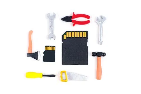 Miniature Hand Tools And Memory Cards For Data Recovery Concept Foto stock