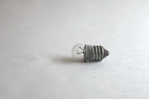 Miniature incandescent bulb with E10 base. for flashlights, indicators and .. Stock Photos