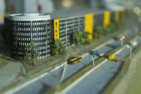 Miniature layout of a city block with multi-level parking. Stock Photos