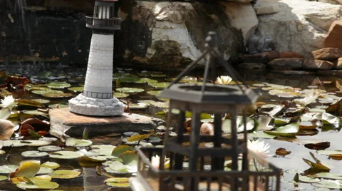 Miniature Lighthouse and Pond Video stock 40807261