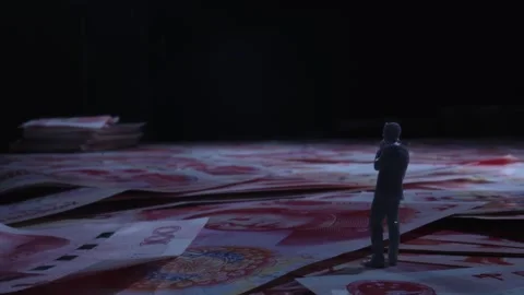 Miniature Man Standing Alone Amongst Scattered Chinese Yuan Banknotes Stockbeeldmateriaal 339067223