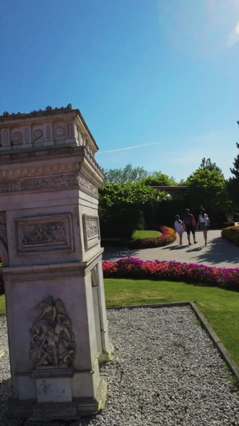 A Miniature Marvel Exploring the Arc de Triomphe Replica in a Beautiful Garden Stock Footage 283641219