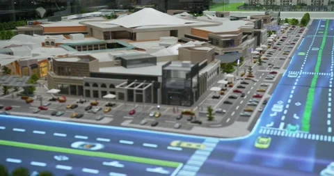 Miniature model of a shopping complex with landscape, roads, cars Stock Footage 263612106