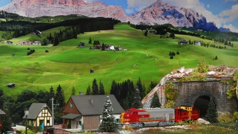 Miniature model of train moving through a mountains ambientation. Stock-Footage 221192478