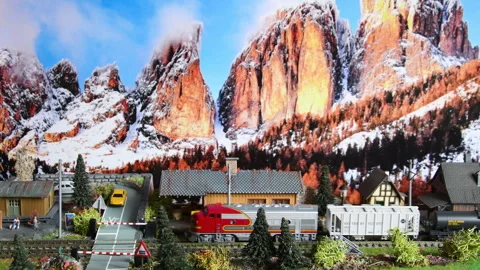 Miniature model of train moving through a mountains ambientation. Stock Footage 241933603