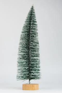 Miniature Model Winter Pine tree with snow is props decoration for create a.. Stock Photos