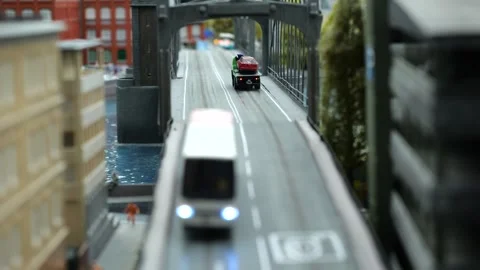 Miniature models of vehicles moving on bridge in city Stock Footage 267007076