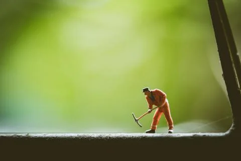 Miniature people, engineer working Stock Photos